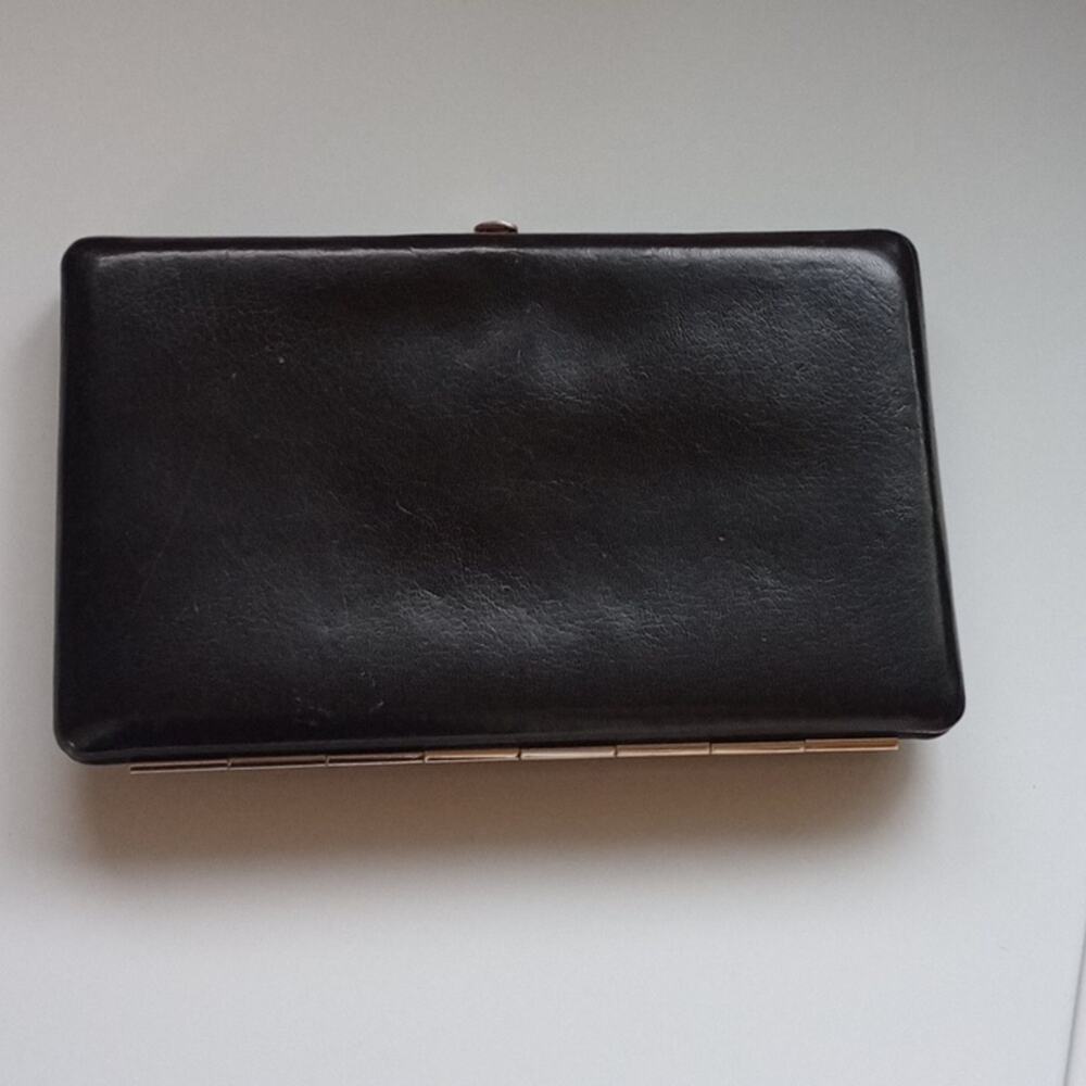 Abas Black Leather Silver Clutch With Clasp Closer And Card Slots.